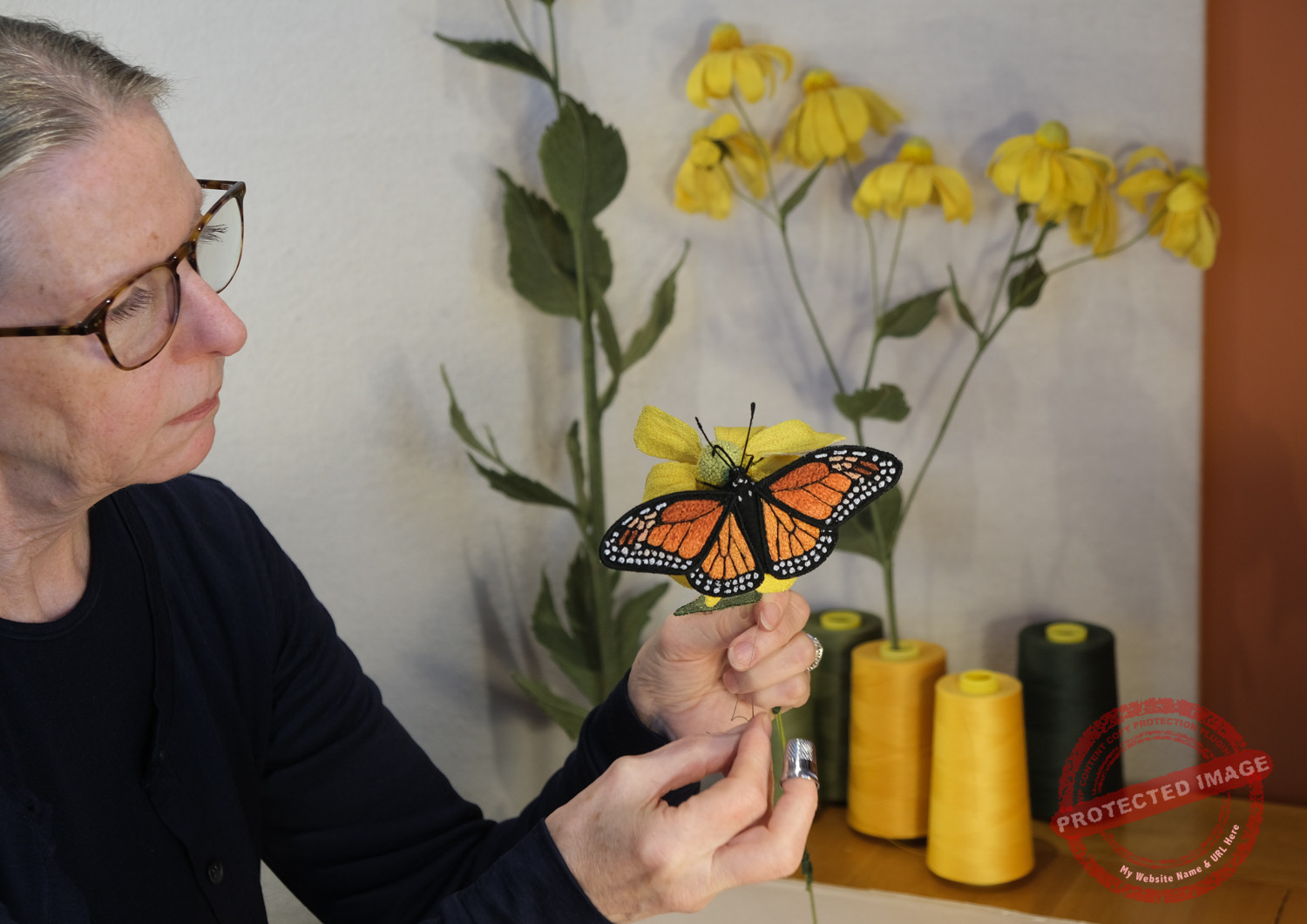 Tracey Lawko with Monarch and Rudbeckia